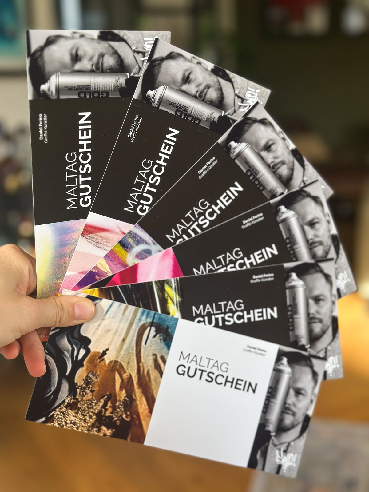 Sortiment der Daniel Ferino Geschenkgutscheine – Verschiedene Wertstufen als hochwertige Karten im Überblick.